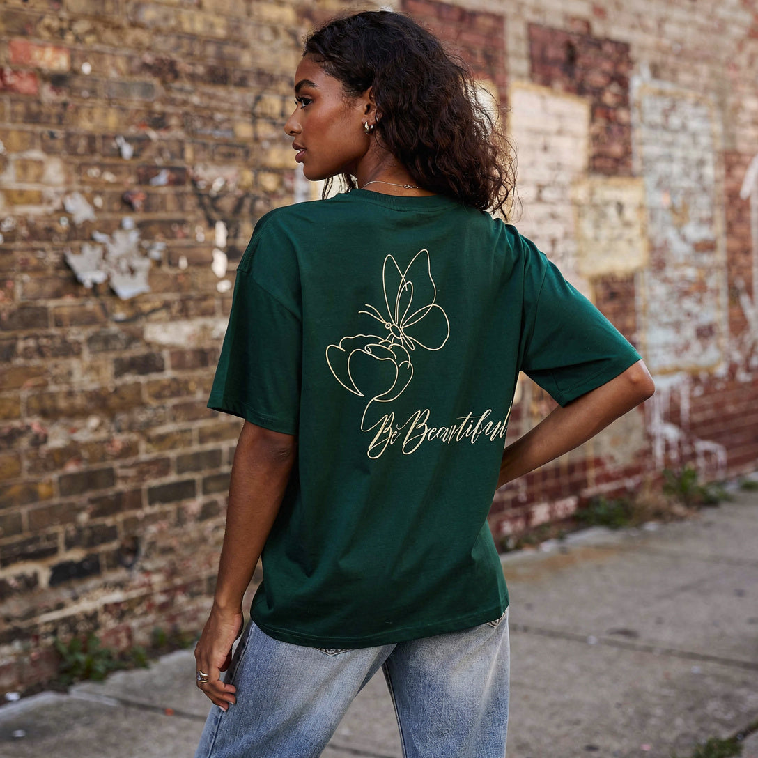 Model wearing Be Beautiful Tee, Eden Green