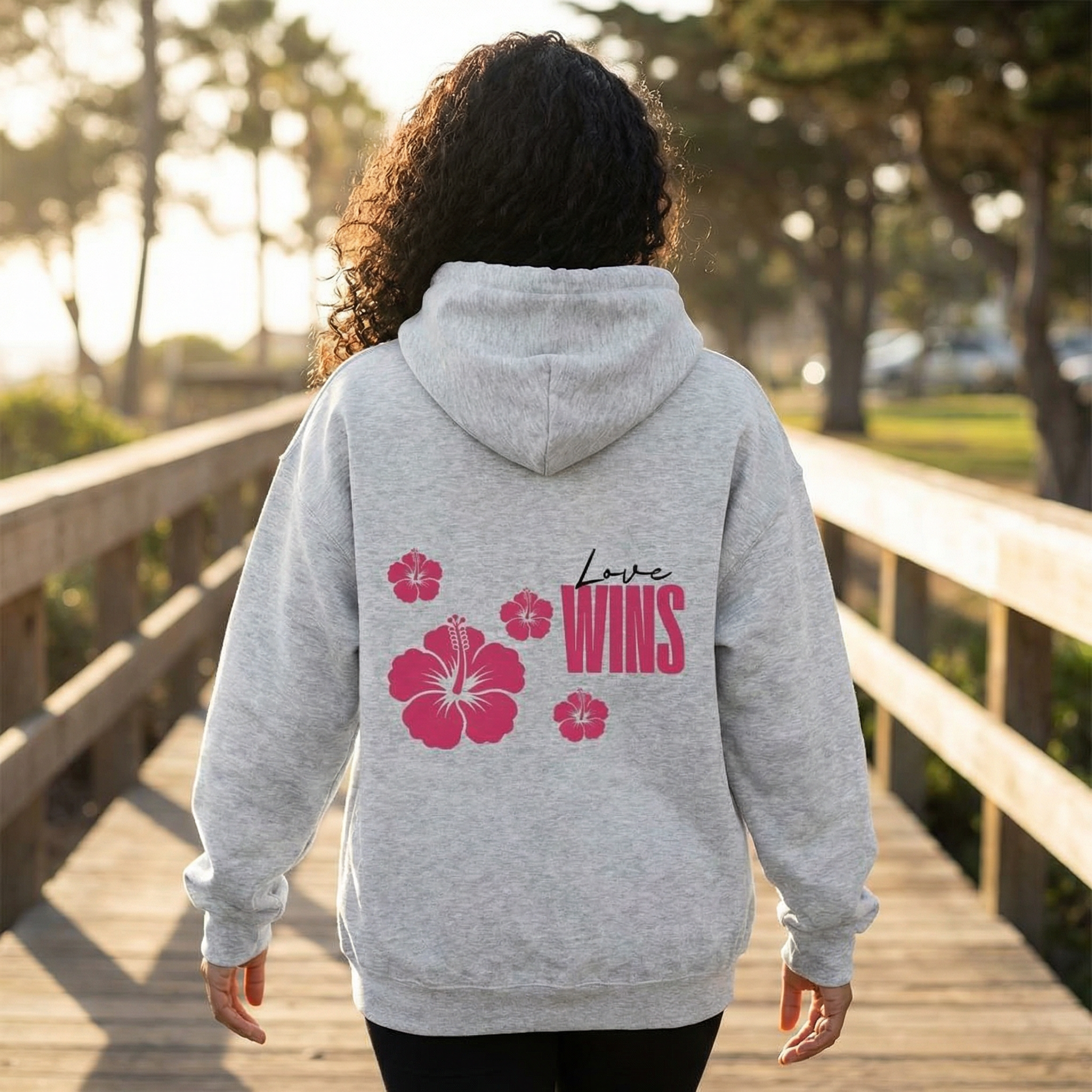 Love Wins pink hibiscus floral oversized hoodie with black lettering — Self Aligned Apparel