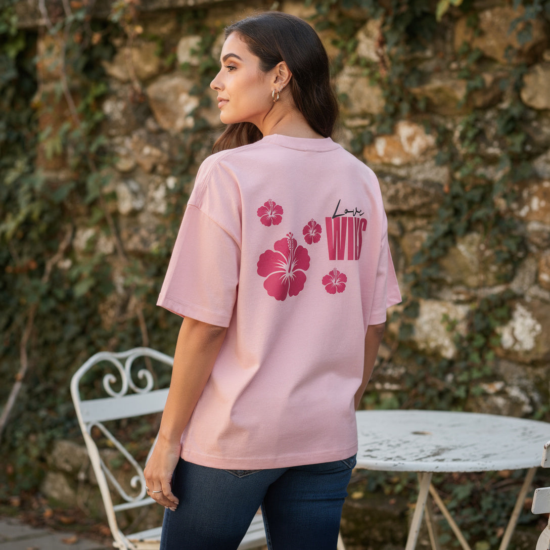 Model wearing Love Wins, Black Lettering, Pink