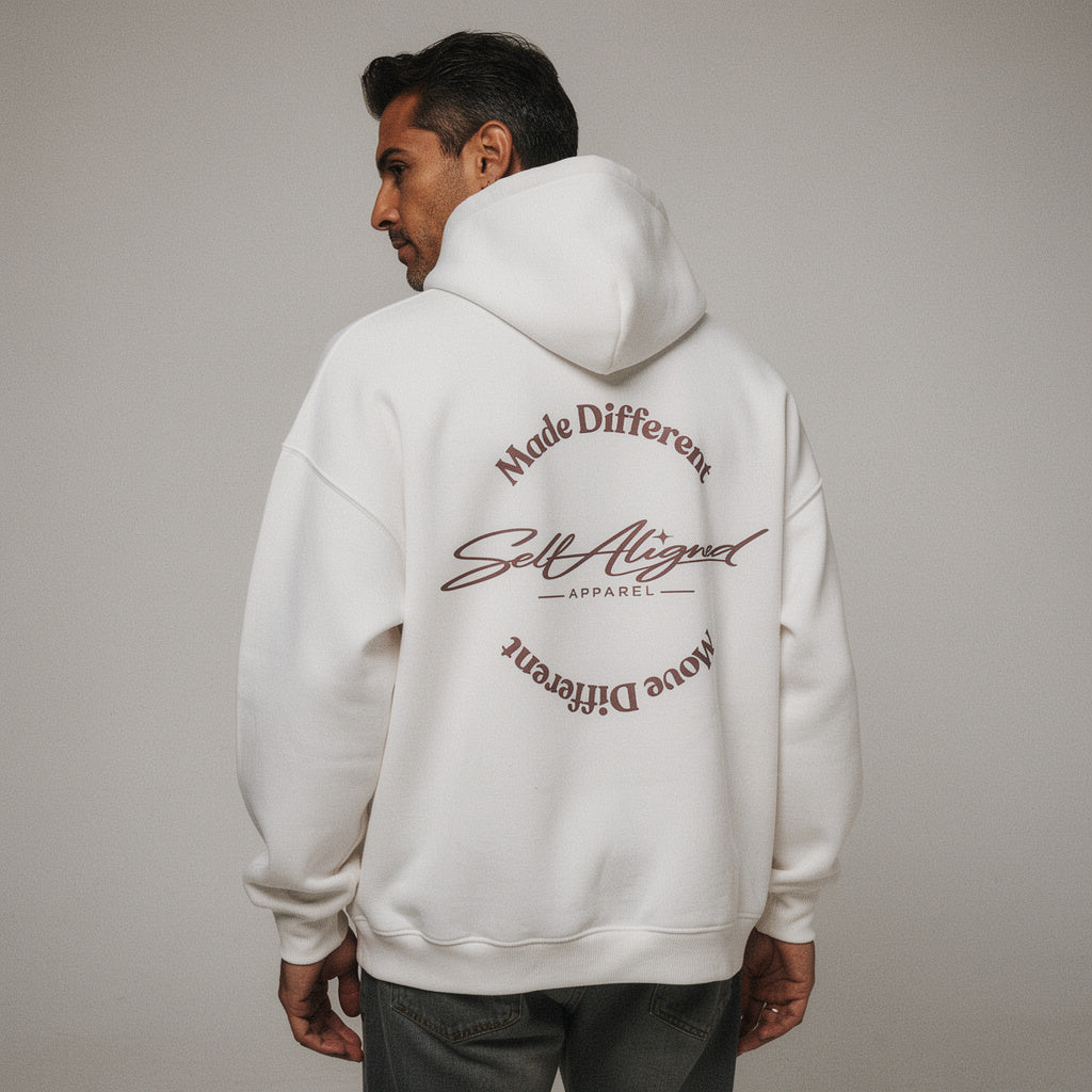 Person wearing Self Aligned Apparel Made Different Move Different hoodie — oversized fit